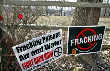 signs opposing fracking in Canada